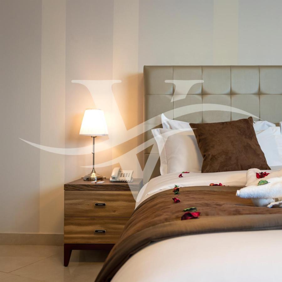 Viola Hotel Apartments Sharjah Esterno foto