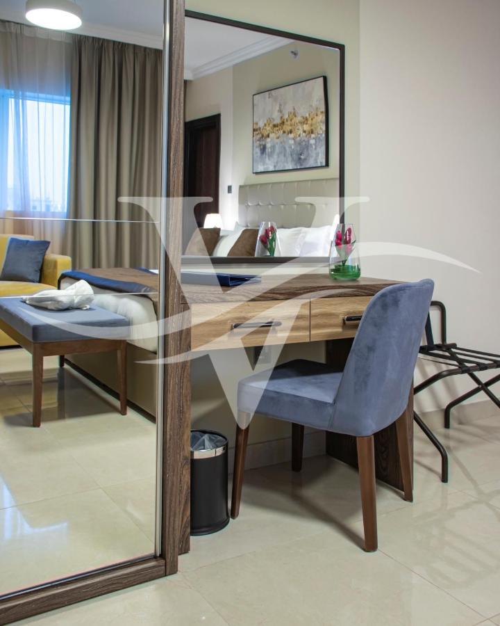 Viola Hotel Apartments Sharjah Esterno foto