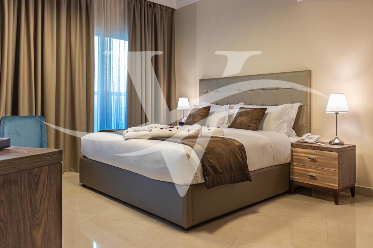 Viola Hotel Apartments Sharjah Esterno foto
