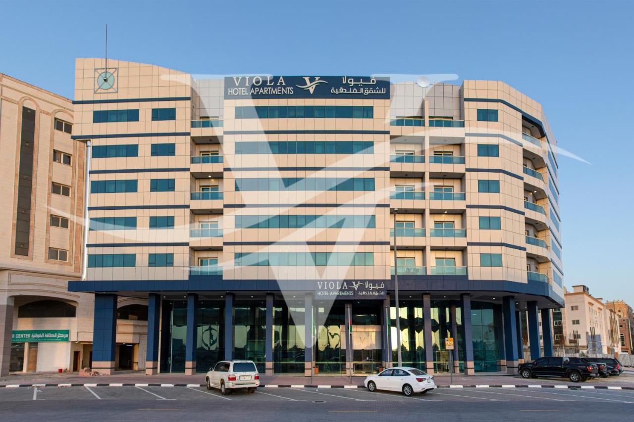 Viola Hotel Apartments Sharjah Esterno foto
