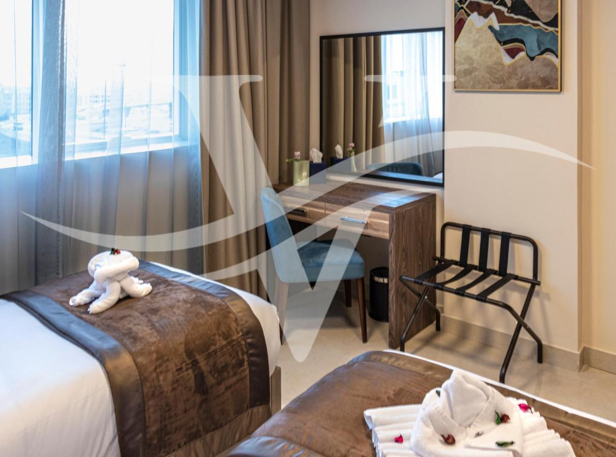 Viola Hotel Apartments Sharjah Esterno foto